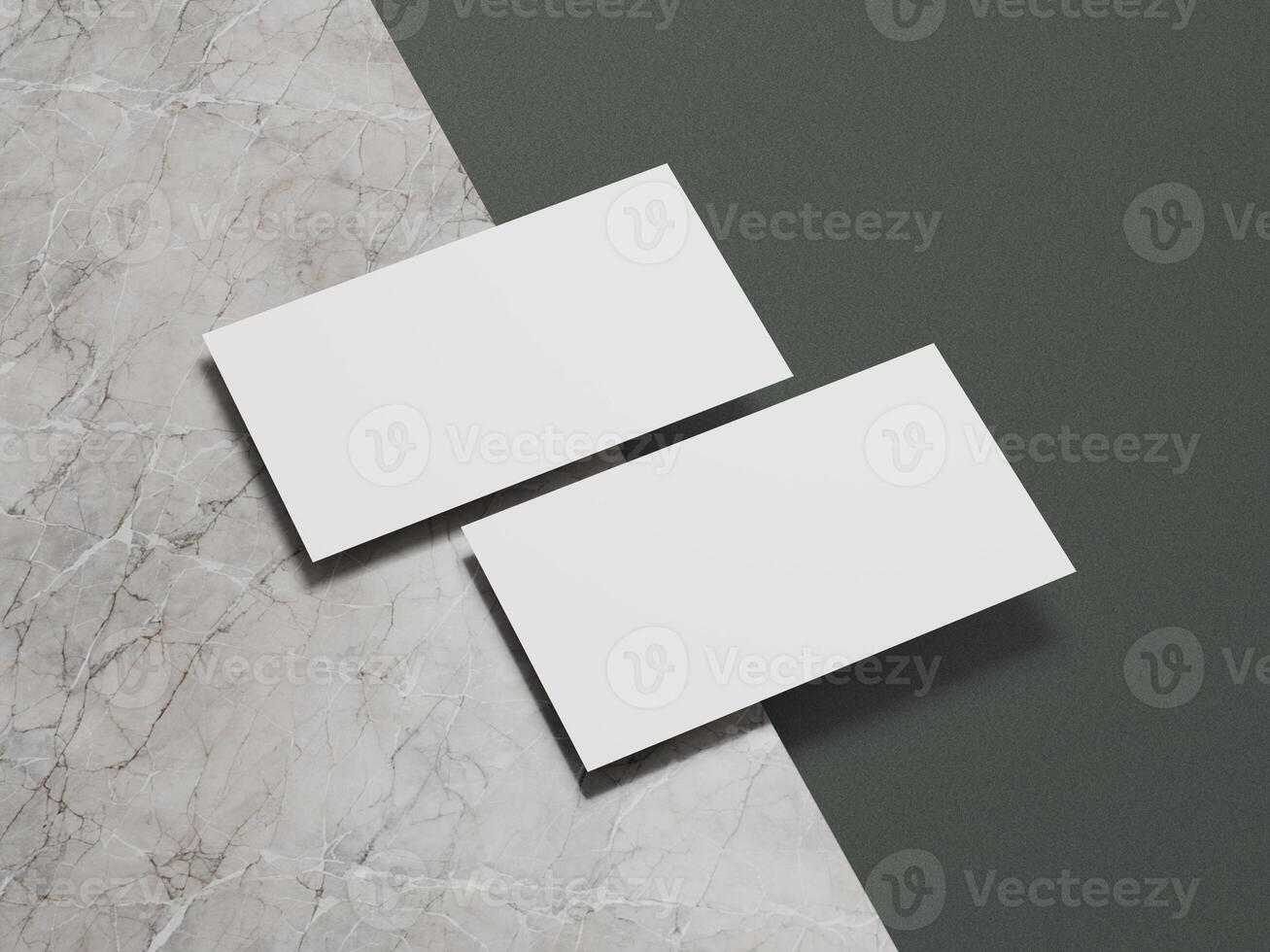 High-quality business card mockup featuring white cards placed on a marble and green textured backdrop. photo