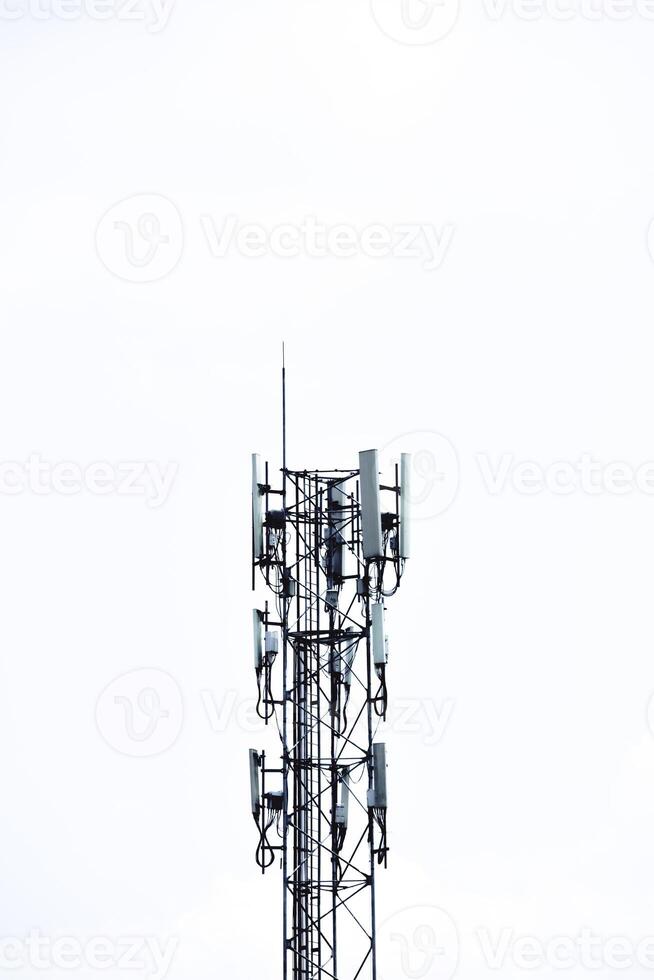 A cell phone tower with multiple antennas photo