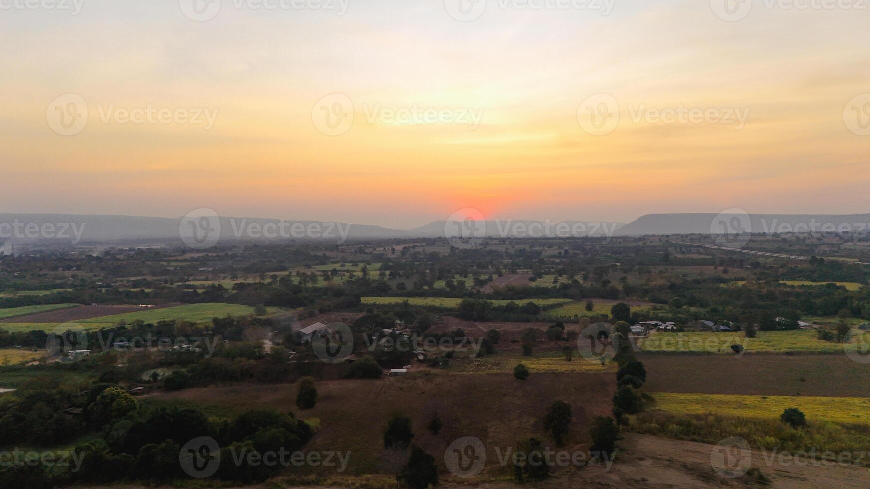A beautiful sunset over a rural area photo