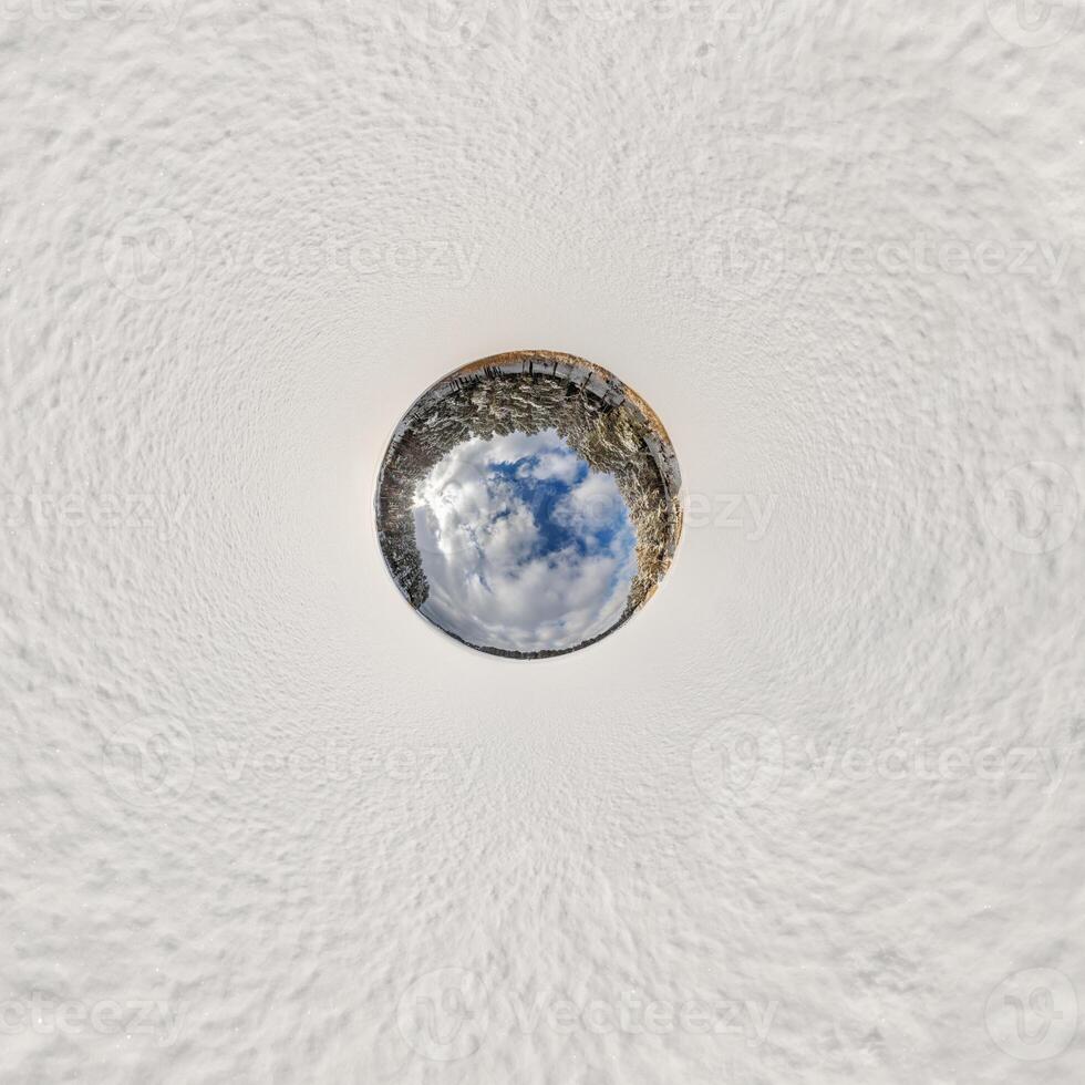A view of the sky from inside a circular hole photo