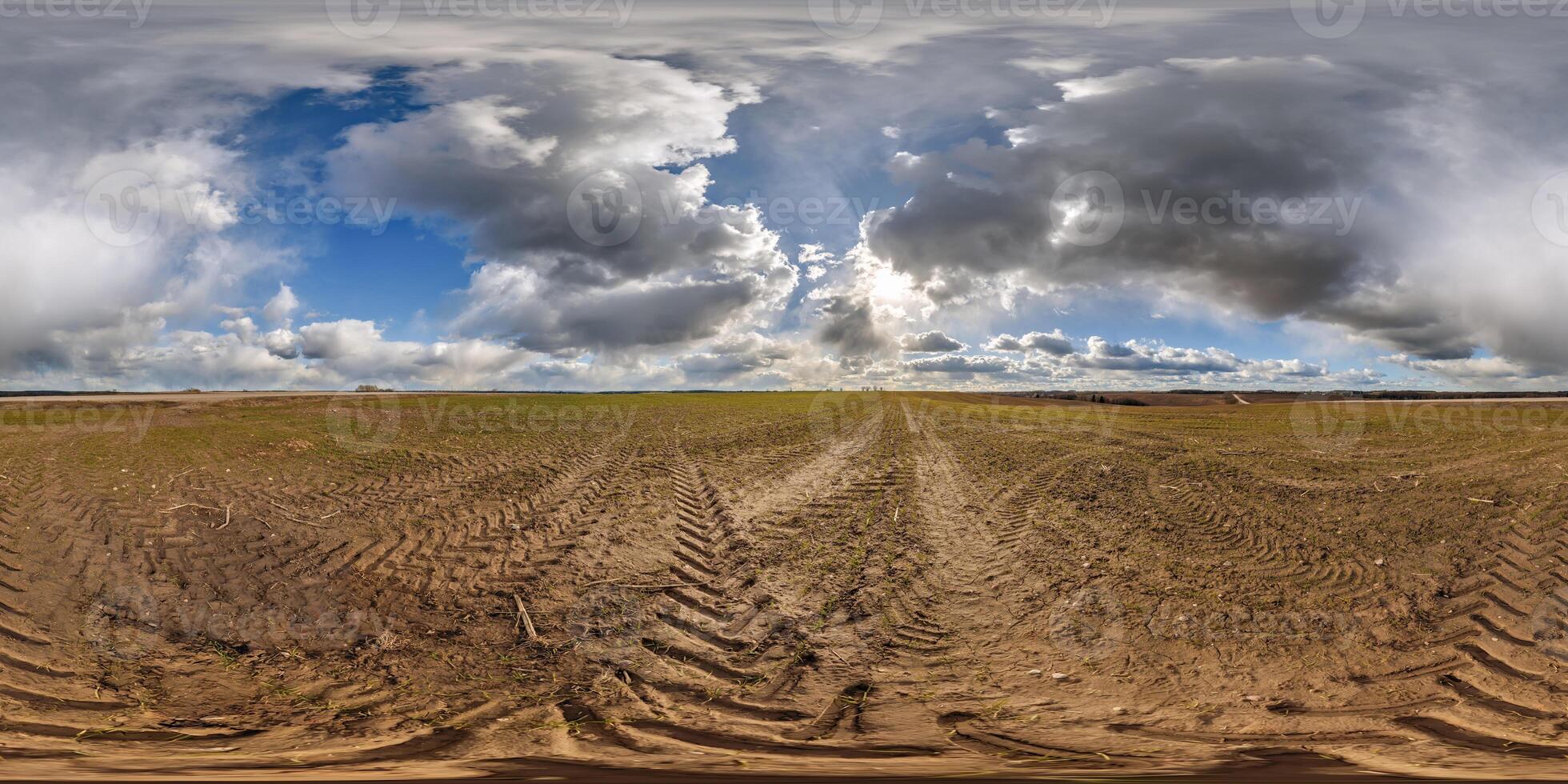 spherical 360 hdri panorama on agro field with clouds and sun on blue sky in equirectangular seamless projection, as sky replacement in drone panoramas, skybox game development photo