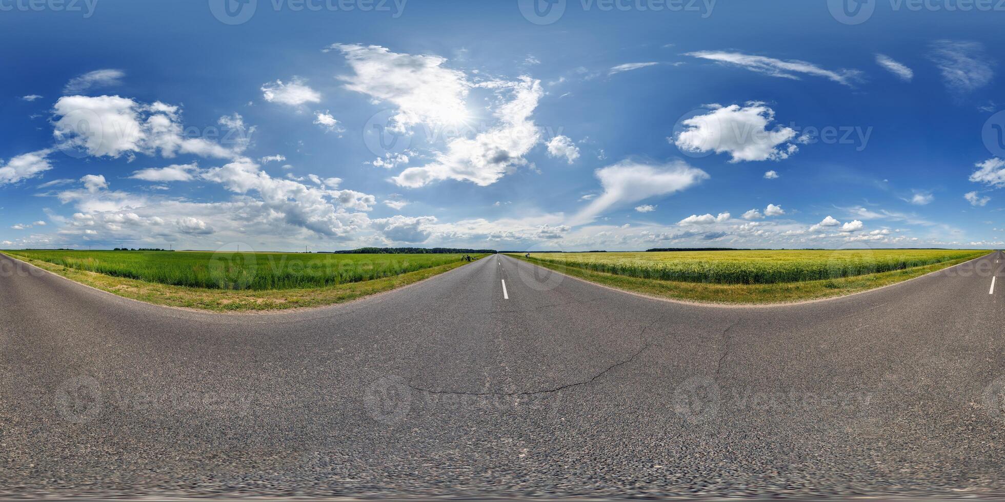 360 view of a road with a sky and clouds photo