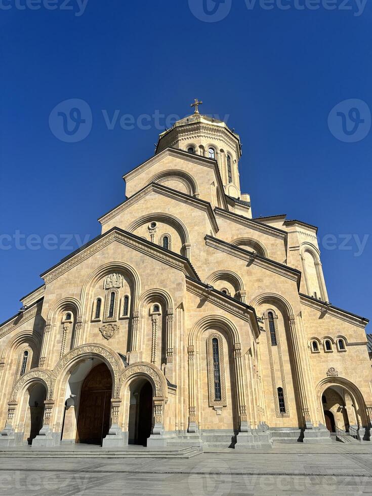 Ornate Facade of a Georgian Cathedral Against a Clear Sky photo
