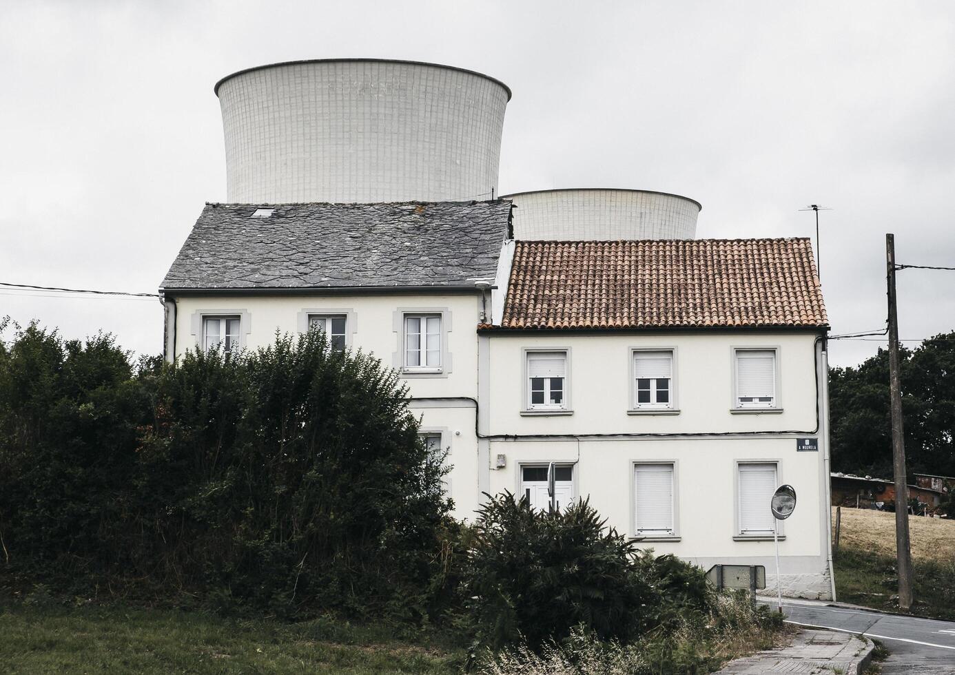 A white house with two chimneys photo