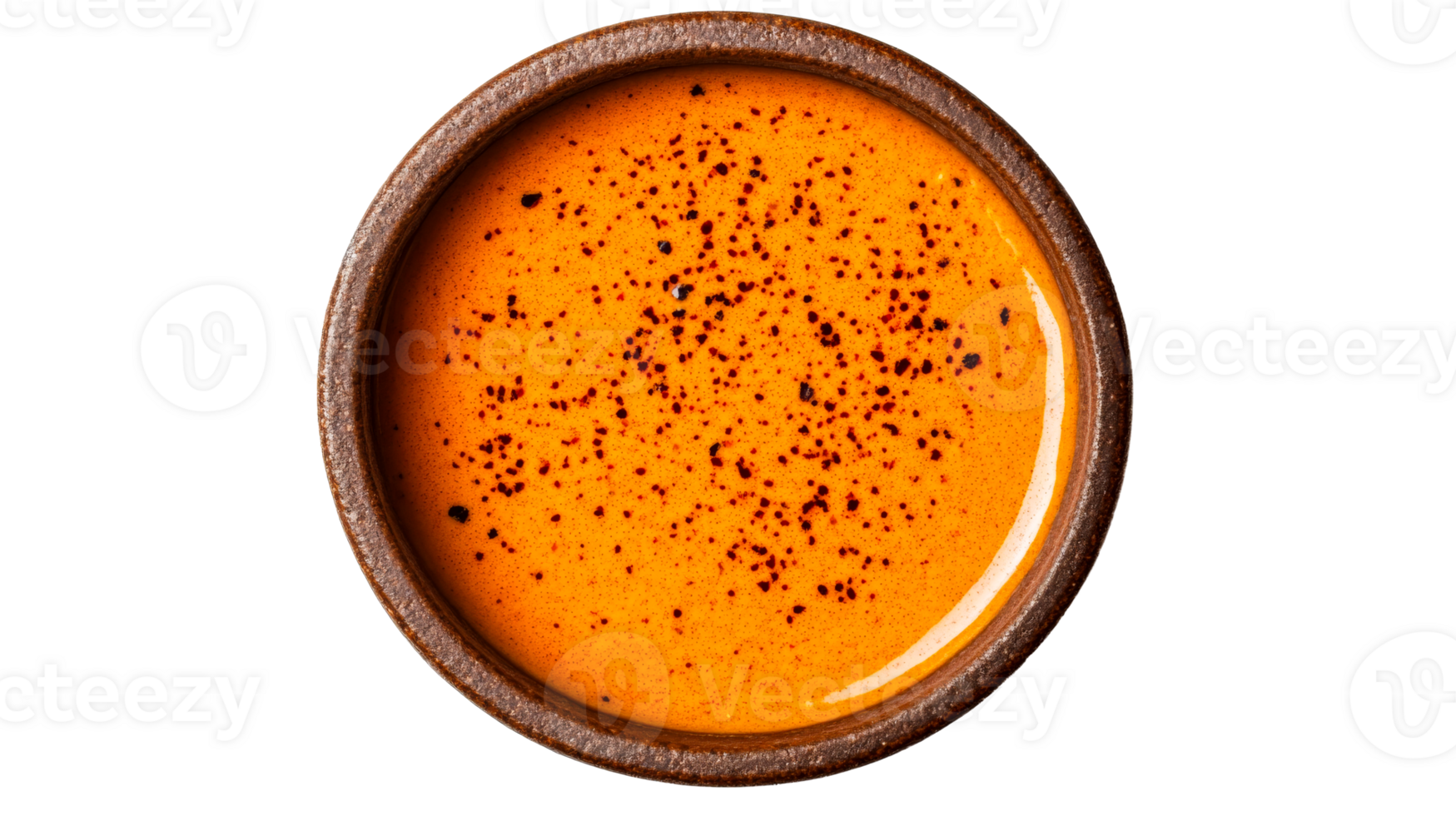 Orange soup with spices in a ceramic bowl, cut out transparent png