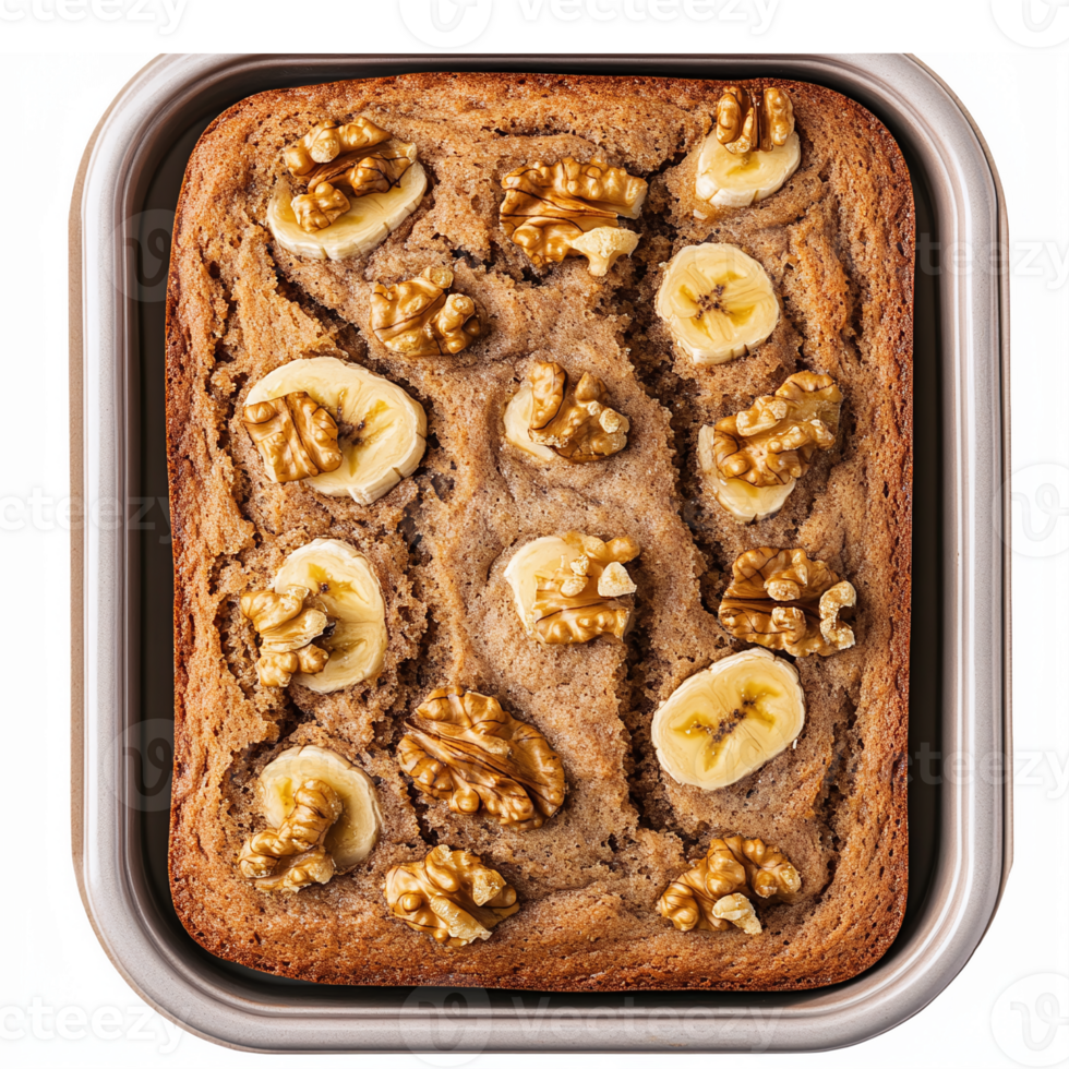 Delicious Banana Walnut Cake Freshly Baked in a Rectangular Pan Topped with Sliced Bananas and Nuts png