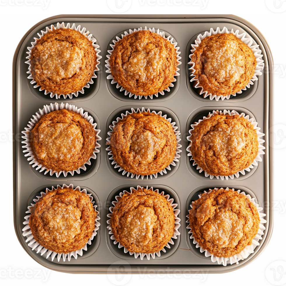Freshly Baked Golden Muffins in a Metallic Muffin Tray with Wrappers Perfect for Dessert Lovers png