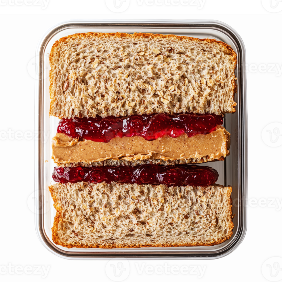 Peanut Butter and Jelly Sandwich on Whole Wheat Bread Featuring Smooth Peanut Butter and Red Jam png