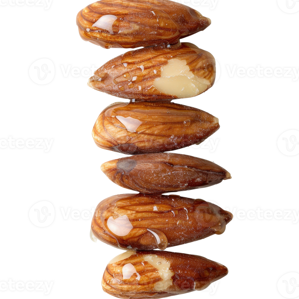 Close-up View of Glazed Almonds Stacked on Each Other with Natural Light Reflection png