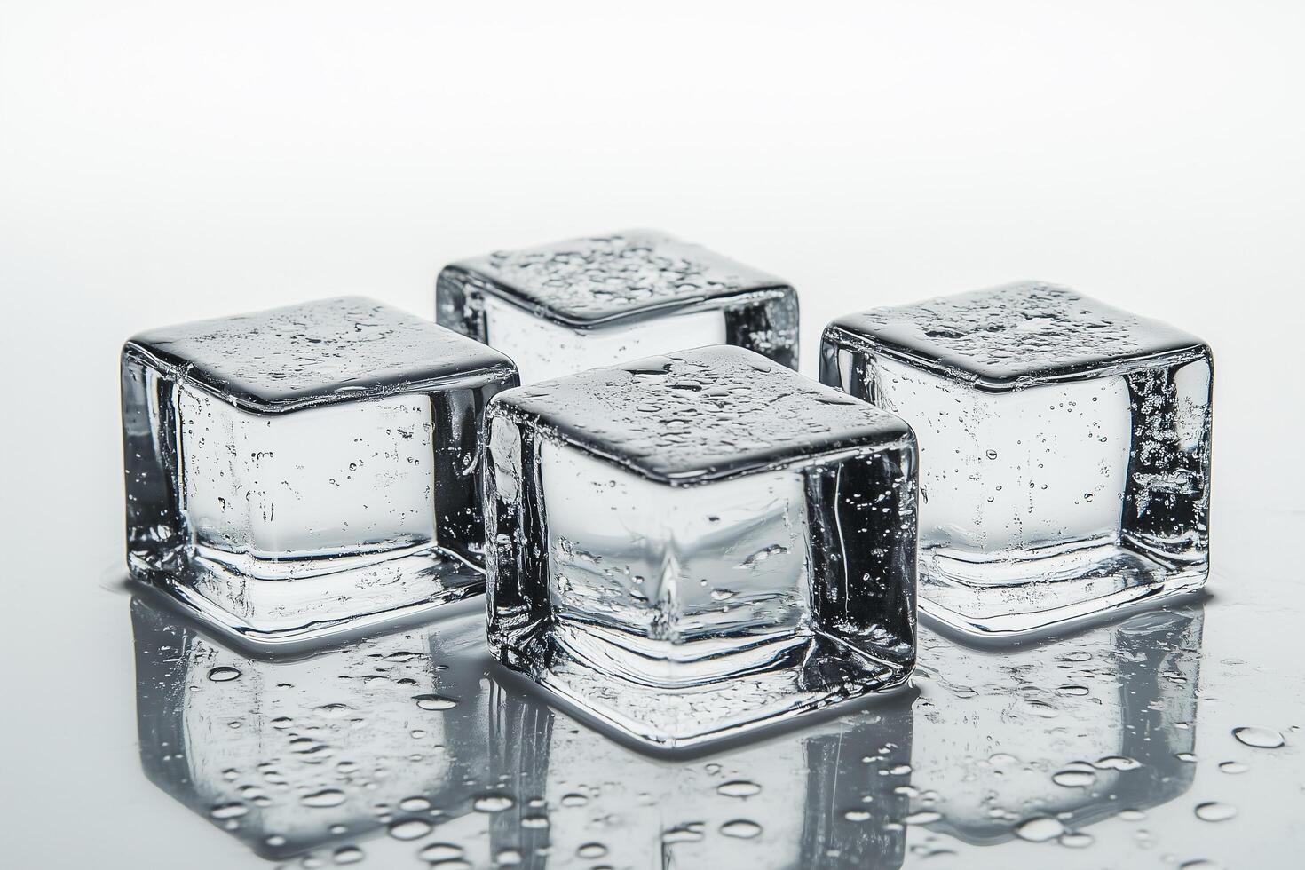 Close-Up View of Transparent Ice Cubes with Bubbles on Clean White Background photo