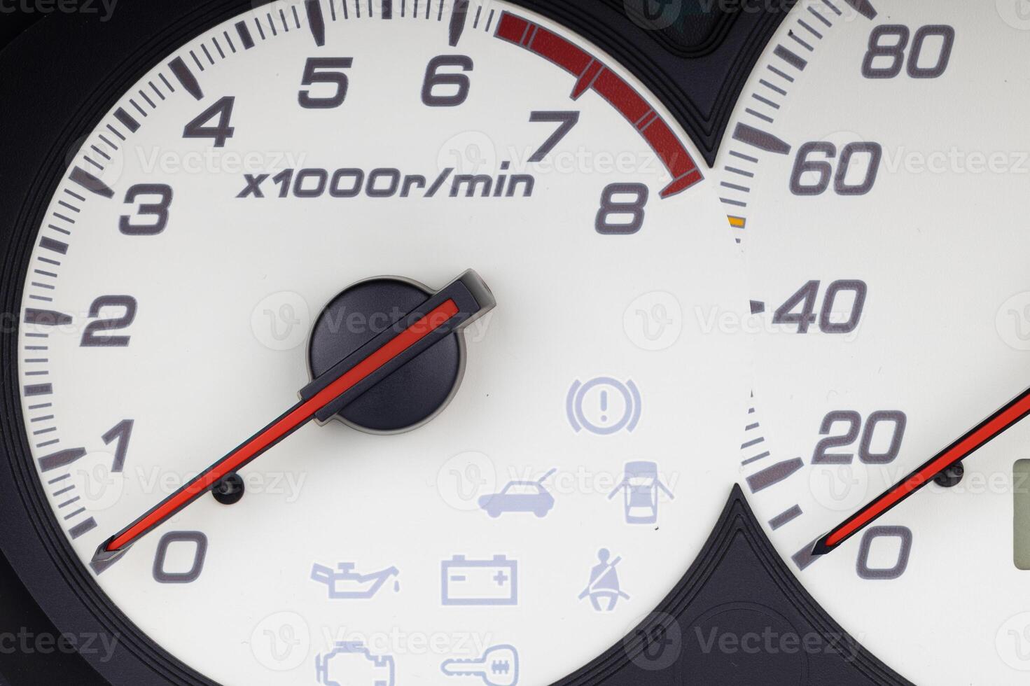 Tachometer and Speedometer with Warning Icons photo