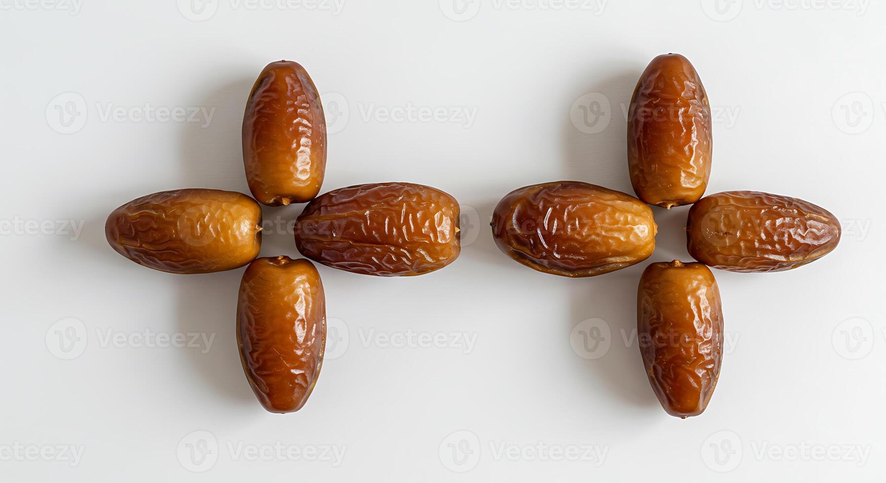 Arrangement of Dates Fruits on White Background photo