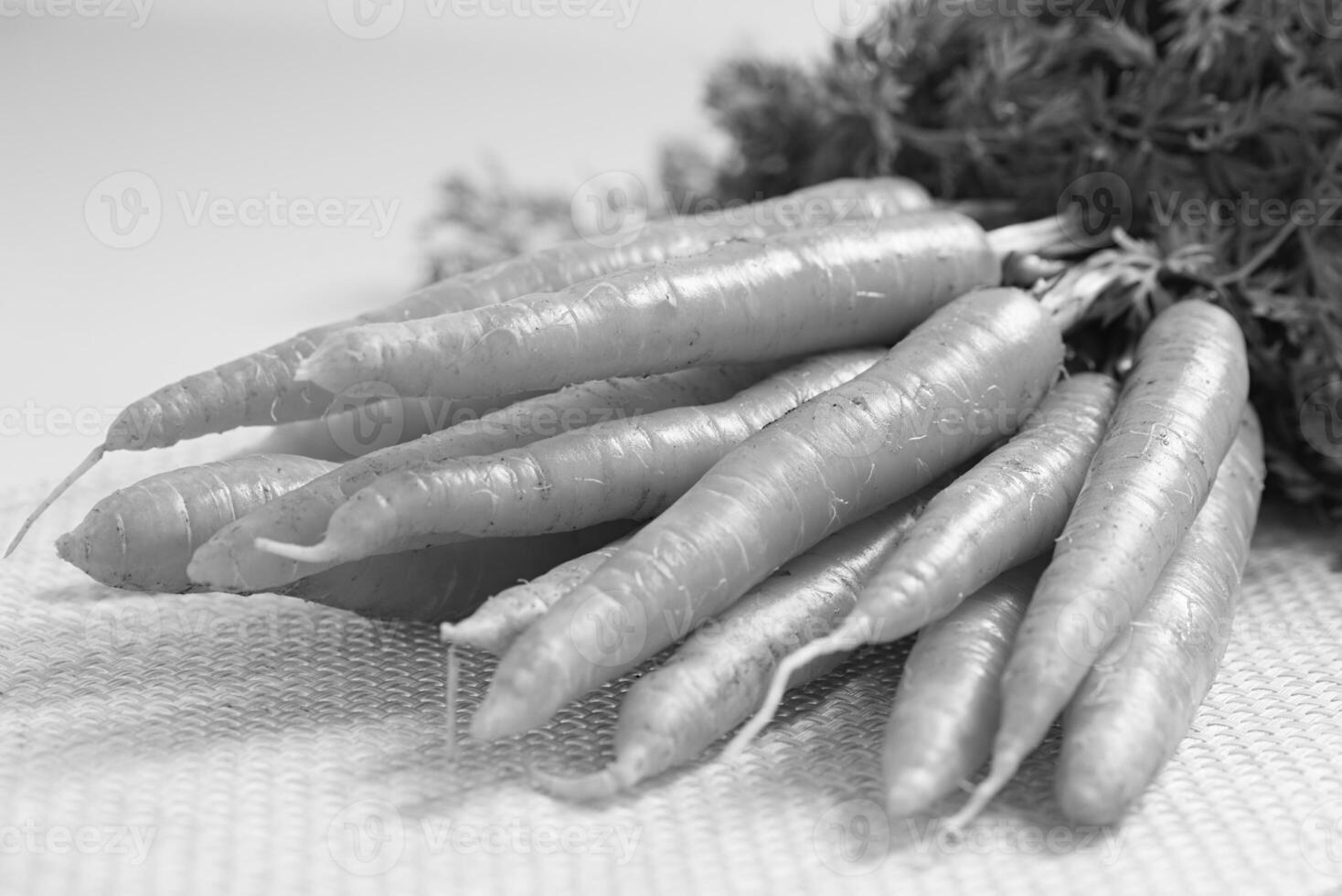 Bunch of Carrots on a Wooden Table Background creative background photo