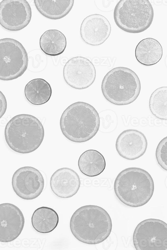 Slices of Orange, Lemon, and Lime on Background creative background photo