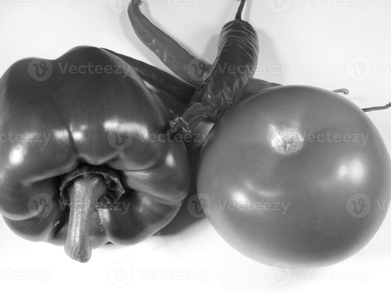 Fresh Vegetables Green Bell Pepper, Tomatoes, and Red Chili Pepper for different design purposes photo