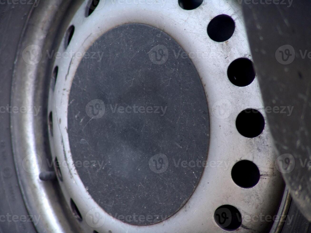 Metallic Wheel Rim with Circular Ventilation Holes photo