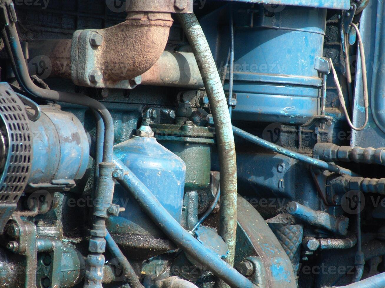 Detailed View of Blue Tractor Motor Components photo