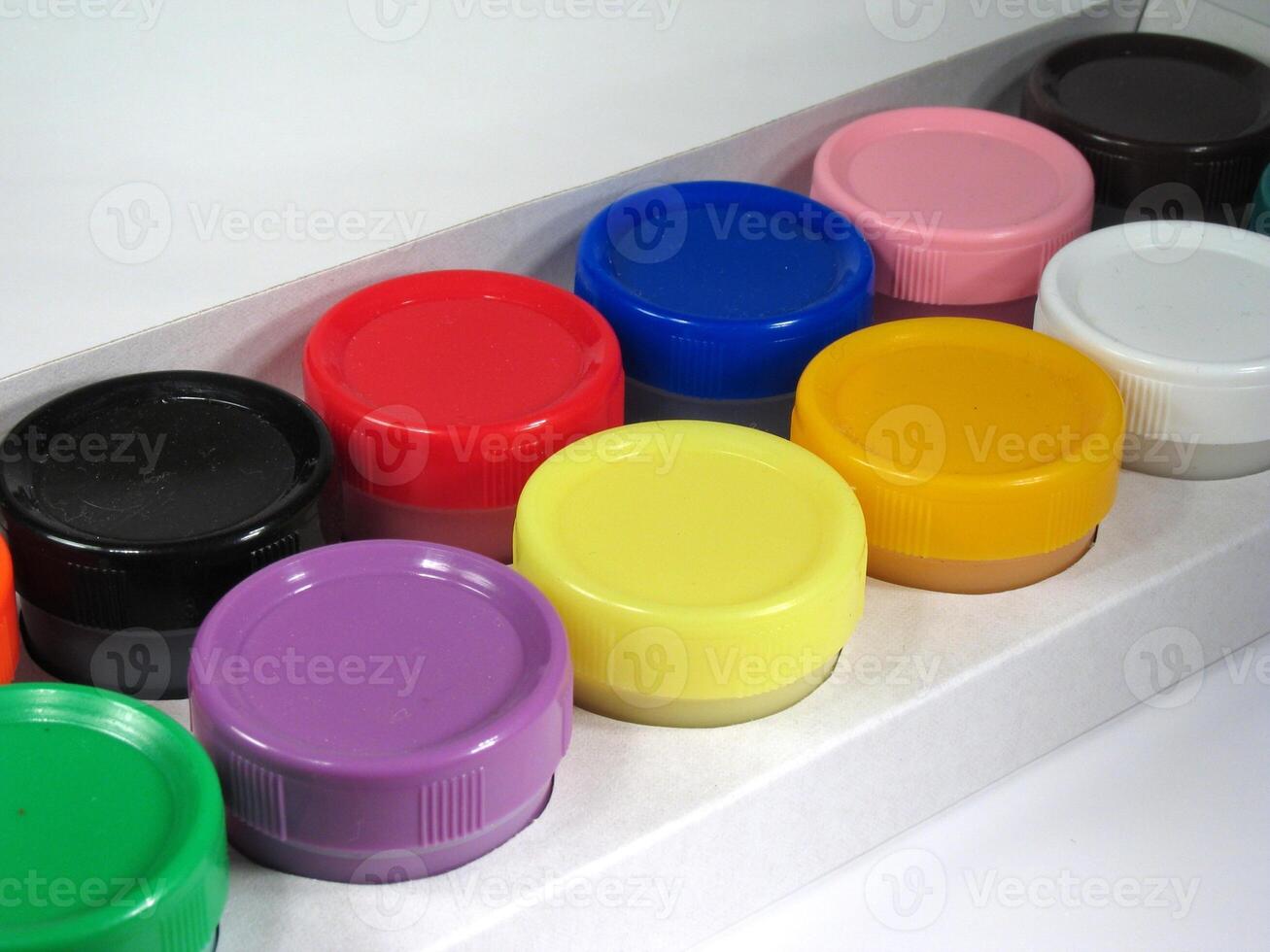 Colored paint cans over white background Version 14 photo