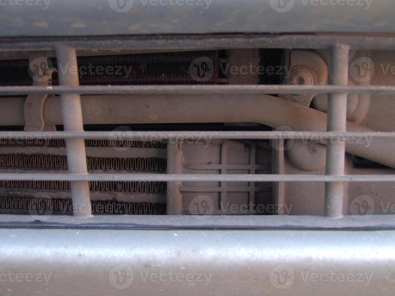 Car Radiator Grill and Cooling System Close Up photo