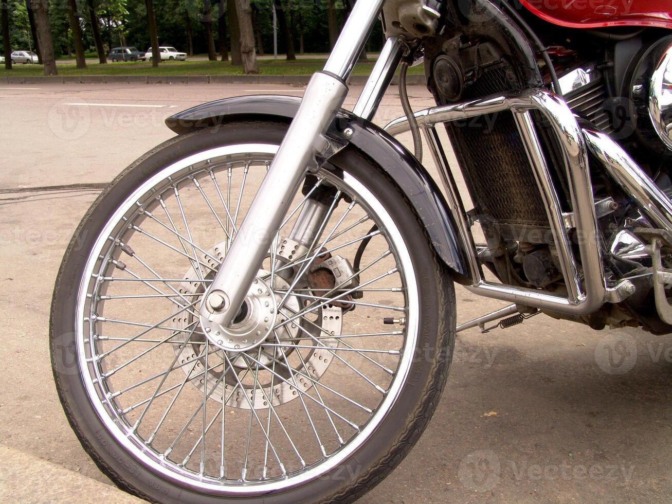 Chrome Motorcycle Wheel and Brake Detail photo