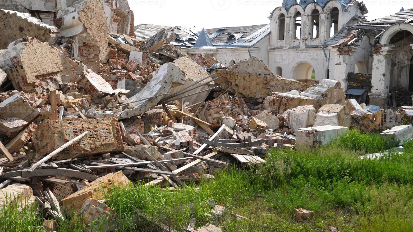 View to destroyed church at Kharkivska oblast. Ruined building after bomb attacks on ukrainian territory from russia army. Consequences of russian invasion of Ukraine. Slow mo photo