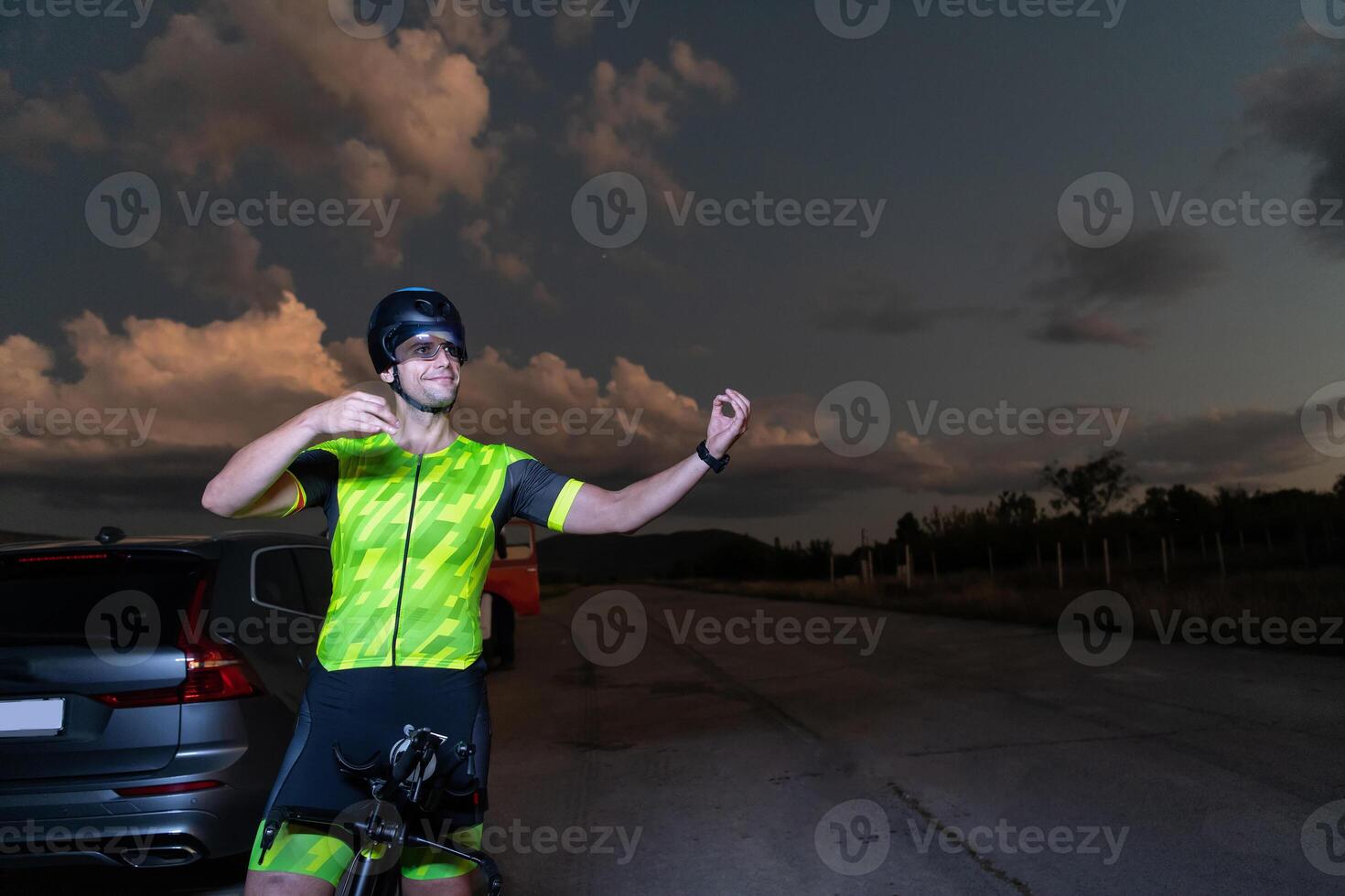 Triathlete in professional gear running early in the morning, preparing for a marathon, dedication to sport and readiness to take on the challenges of a marathon. photo