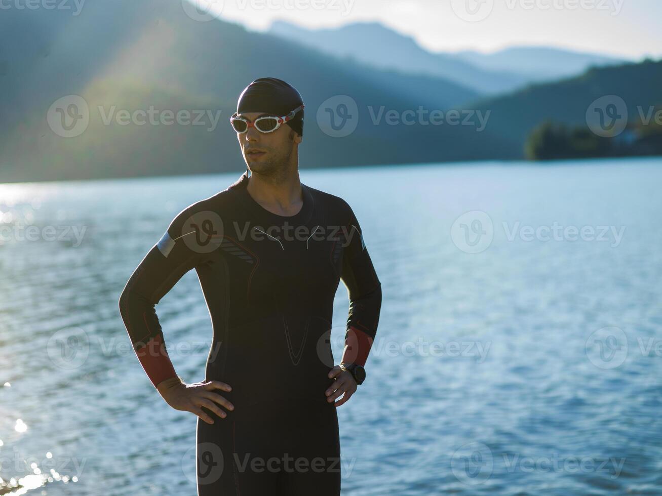 A triathlon swimmer preparing for a river training to gear up for a marathon photo