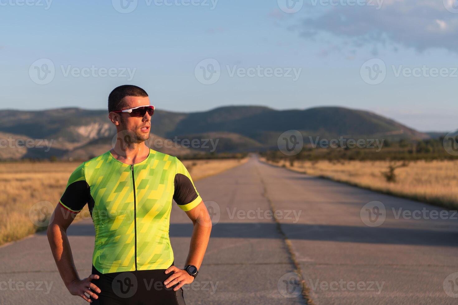 Triathlete resting after exhausting training for the upcoming marathon. photo