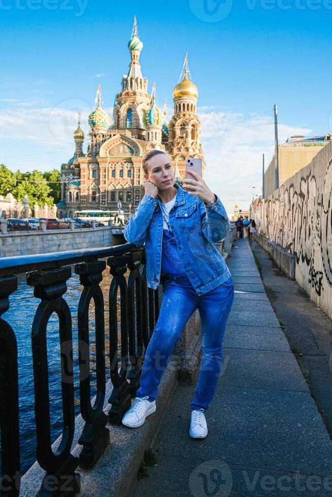 woman using phone in a city lifestyle connection, casual business concept photo