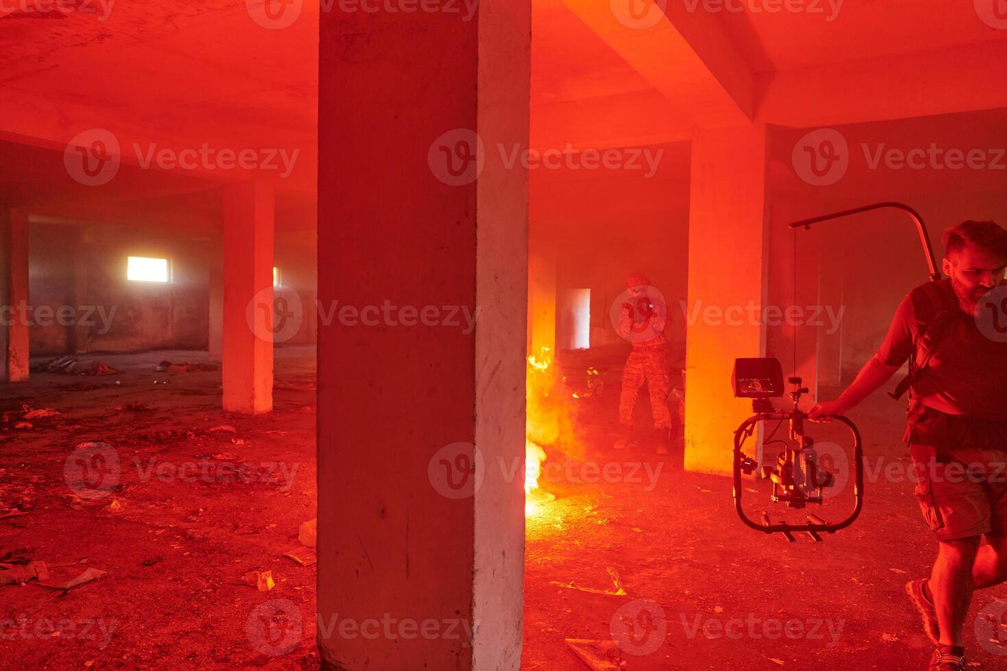 A professional cameraman captures the intense moments as a group of skilled soldiers embarks on a dangerous mission inside an abandoned building, their actions filled with suspense and bravery photo