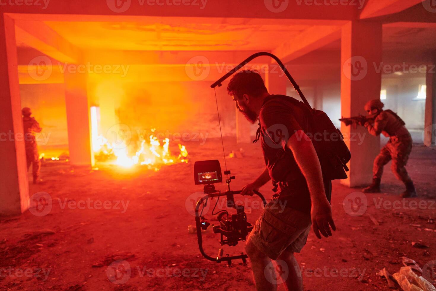 A professional cameraman captures the intense moments as a group of skilled soldiers embarks on a dangerous mission inside an abandoned building, their actions filled with suspense and bravery photo