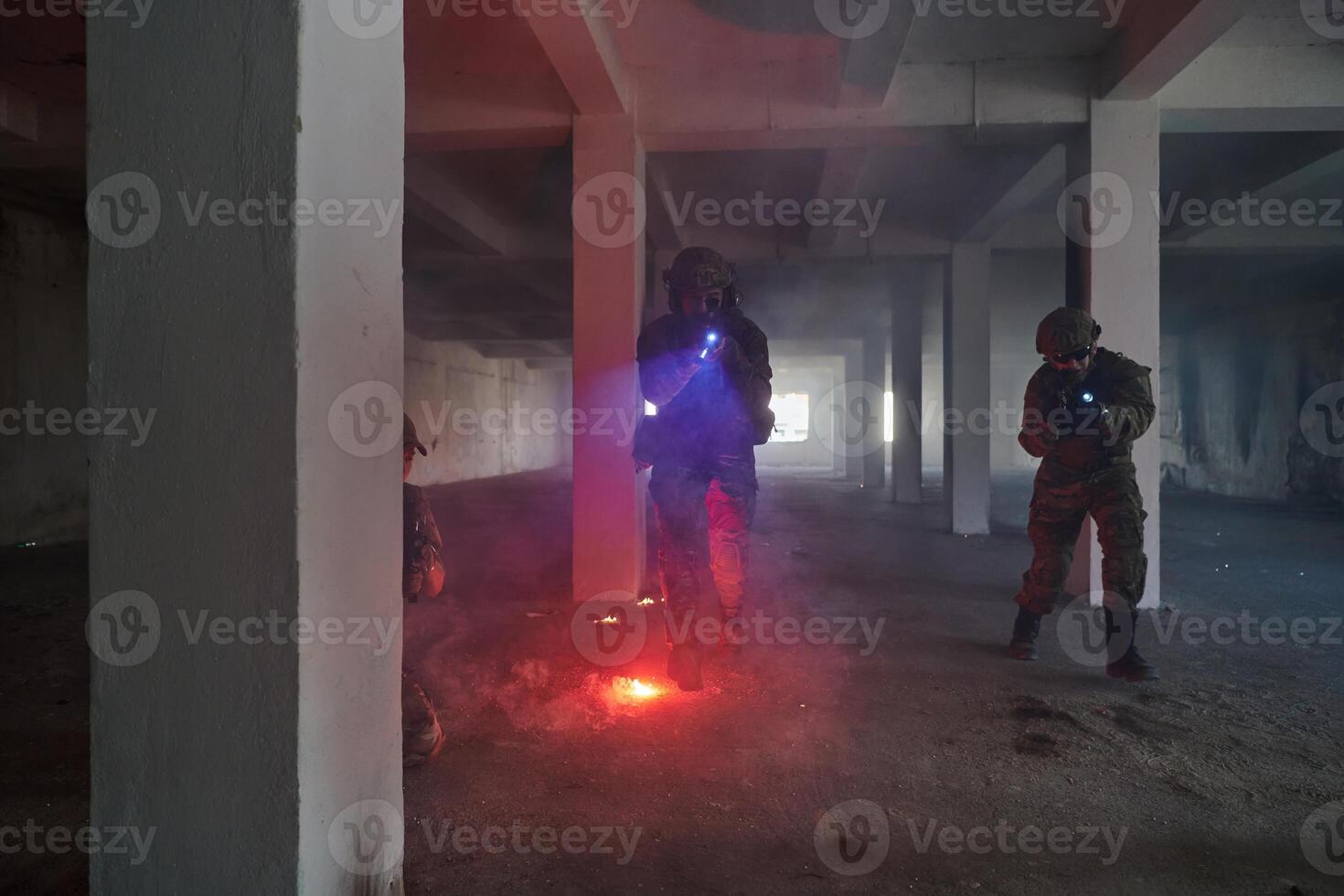 A group of professional soldiers bravely executes a dangerous rescue mission, surrounded by fire in a perilous building. photo