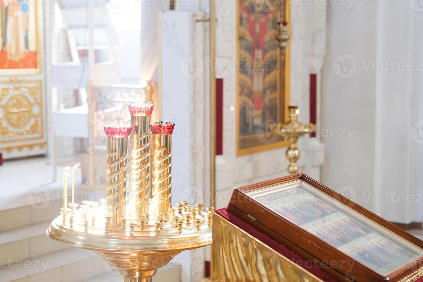 candle light in the temple opposite the icons photo