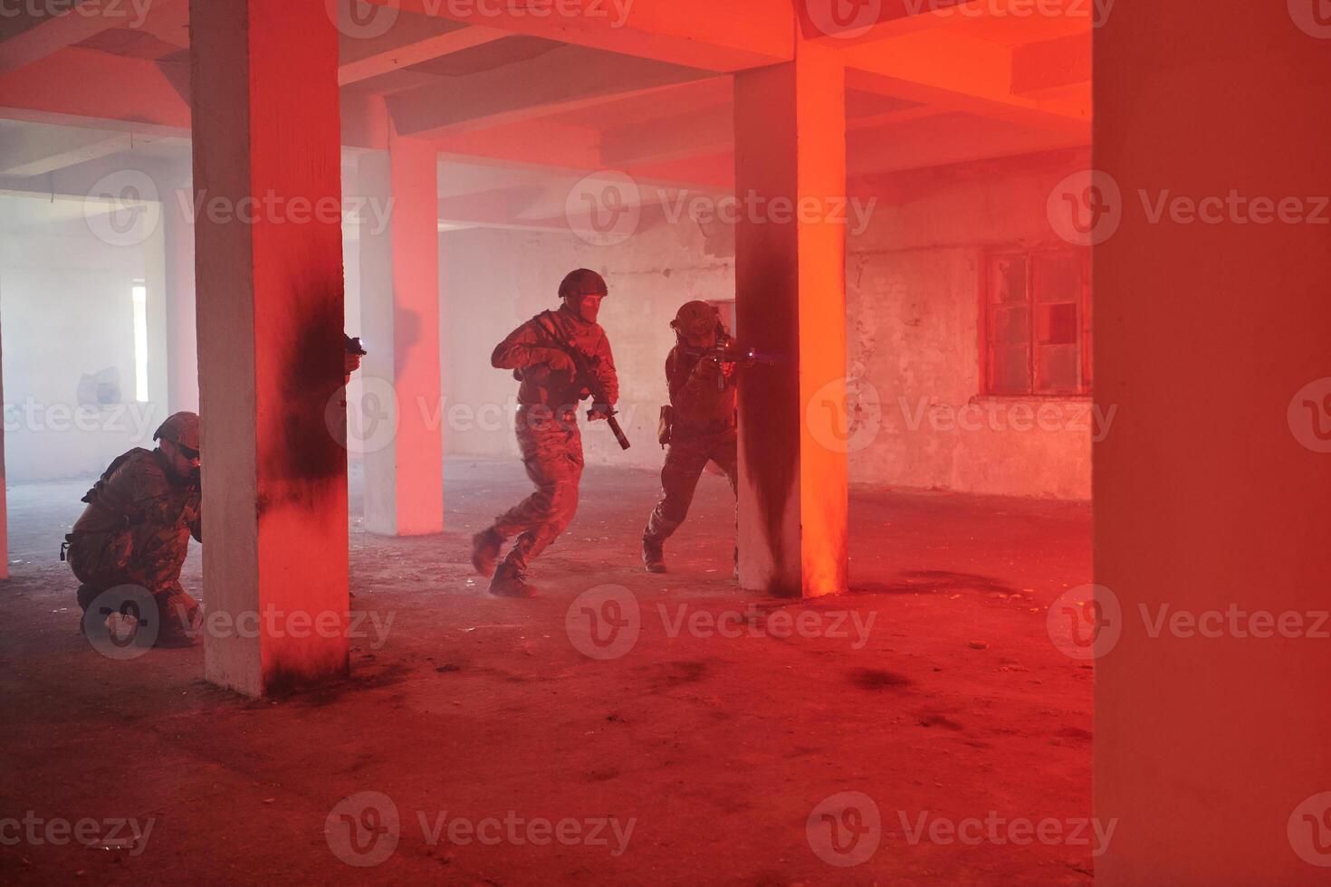A group of professional soldiers bravely executes a dangerous rescue mission, surrounded by fire in a perilous building. photo