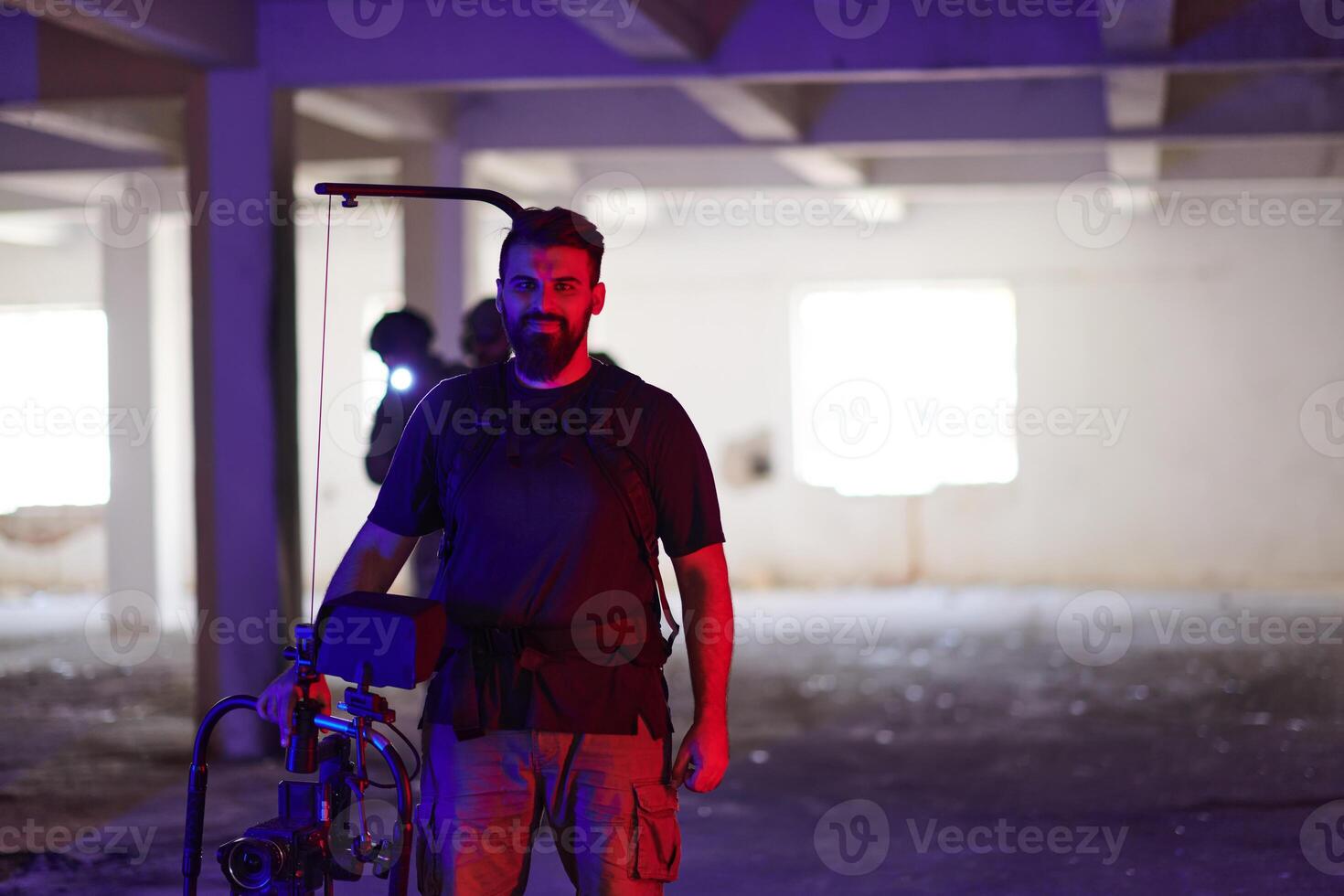 A professional cameraman captures the intense moments as a group of skilled soldiers embarks on a dangerous mission inside an abandoned building, their actions filled with suspense and bravery photo