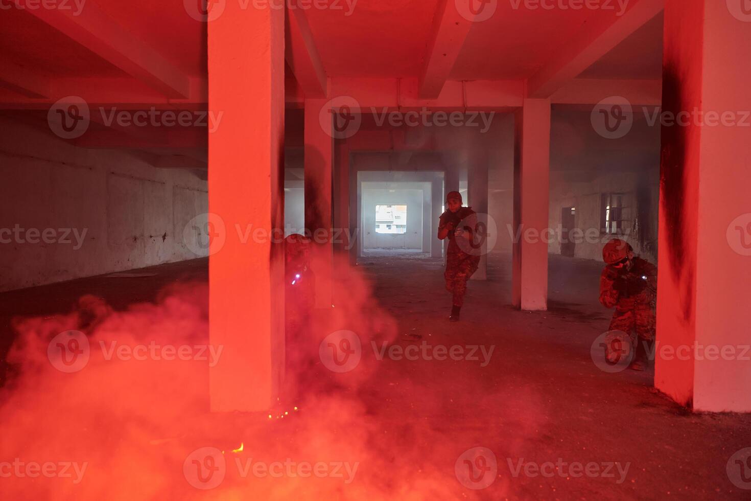 A group of professional soldiers bravely executes a dangerous rescue mission, surrounded by fire in a perilous building. photo