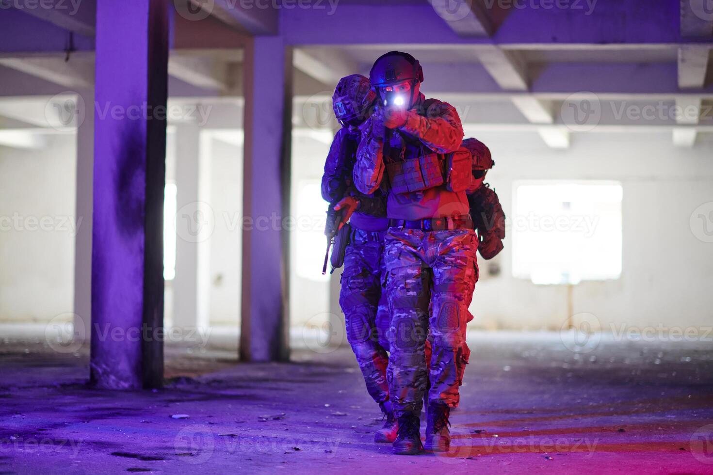A group of professional soldiers bravely executes a dangerous rescue mission, surrounded by fire in a perilous building. photo
