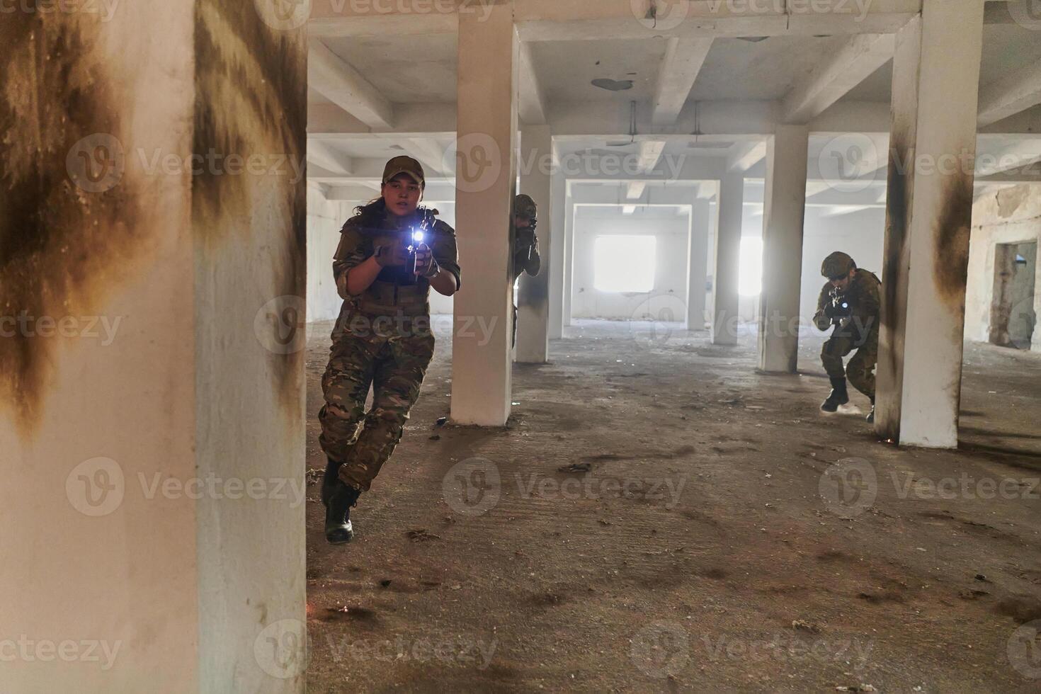 A group of professional soldiers bravely executes a dangerous rescue mission, surrounded by fire in a perilous building. photo