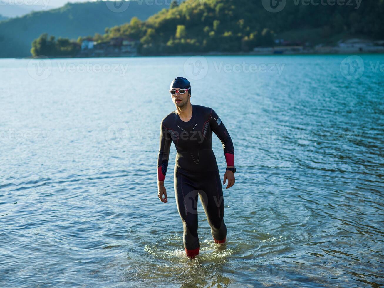 A triathlon swimmer preparing for a river training to gear up for a marathon photo