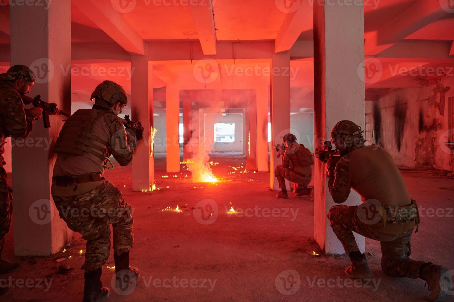 A group of professional soldiers bravely executes a dangerous rescue mission, surrounded by fire in a perilous building. photo