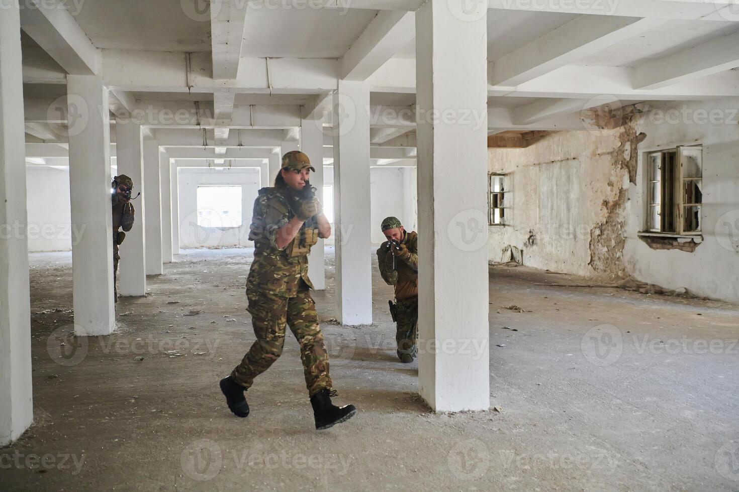 A group of professional soldiers bravely executes a dangerous rescue mission, surrounded by fire in a perilous building. photo