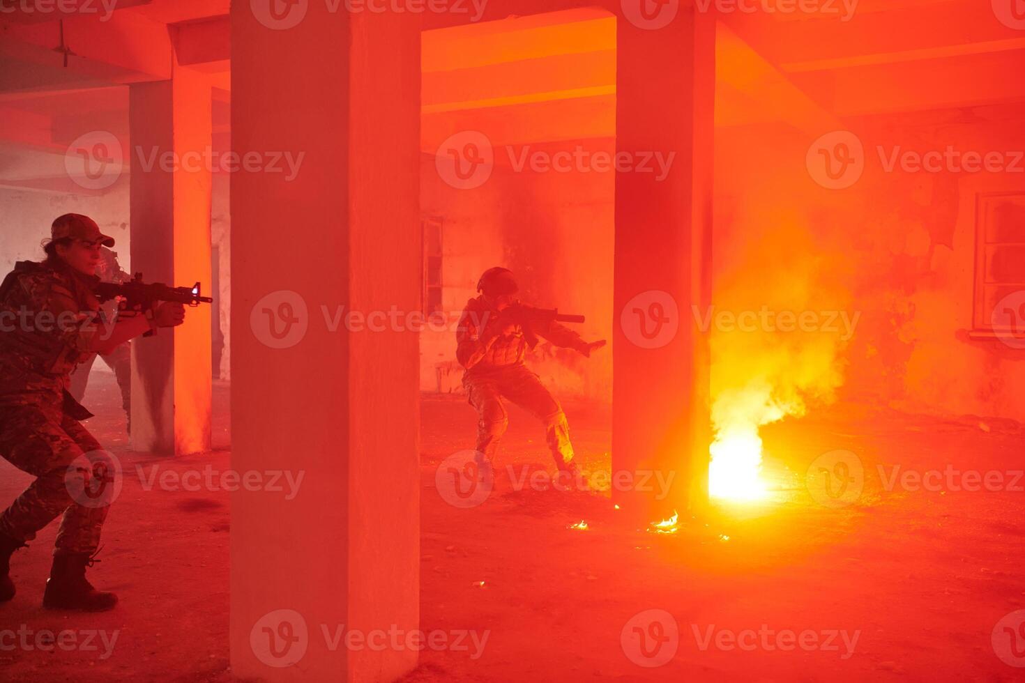 A group of professional soldiers bravely executes a dangerous rescue mission, surrounded by fire in a perilous building. photo