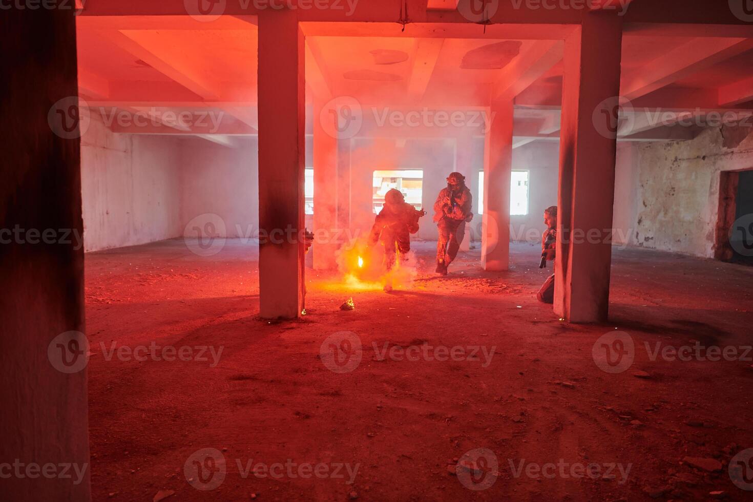 A group of professional soldiers bravely executes a dangerous rescue mission, surrounded by fire in a perilous building. photo