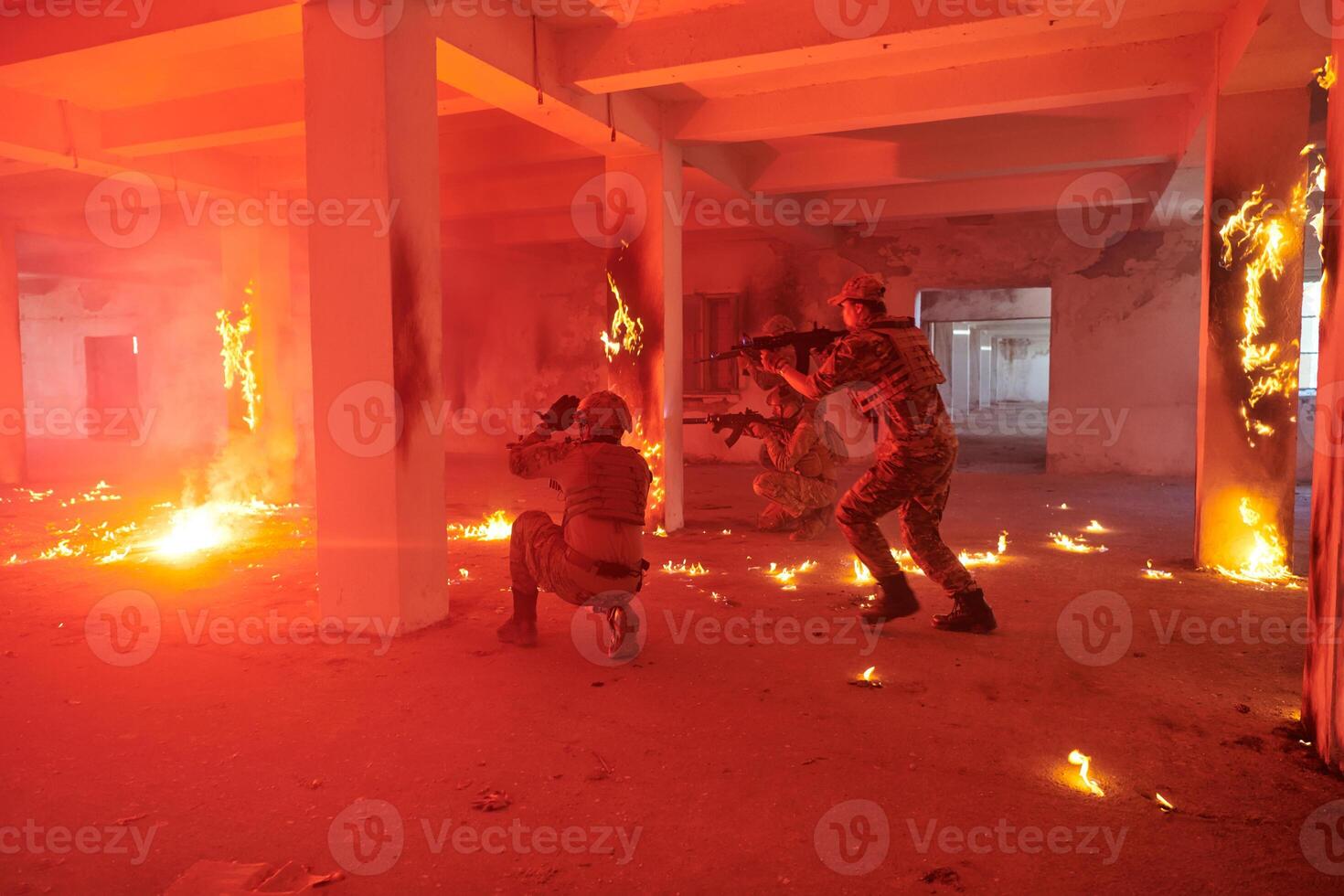 A group of professional soldiers bravely executes a dangerous rescue mission, surrounded by fire in a perilous building. photo