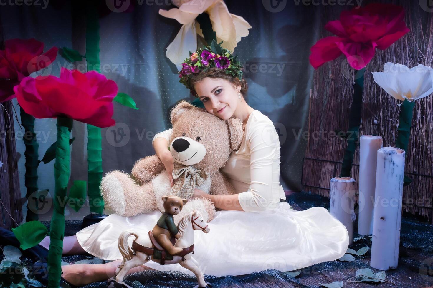 girl in the image of a flower on a background of flowers photo