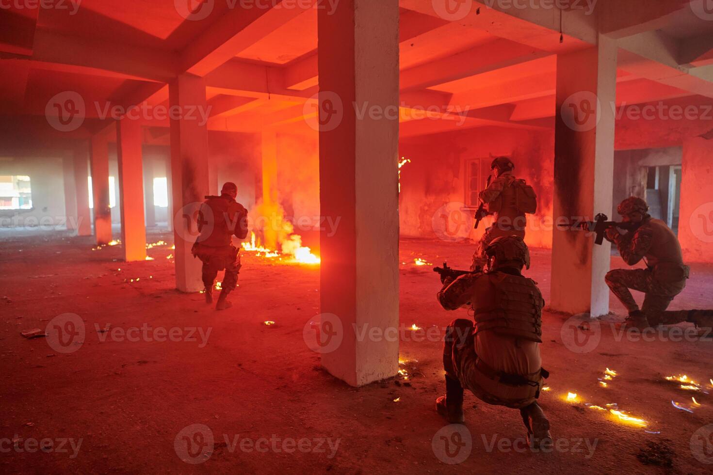 A group of professional soldiers bravely executes a dangerous rescue mission, surrounded by fire in a perilous building. photo