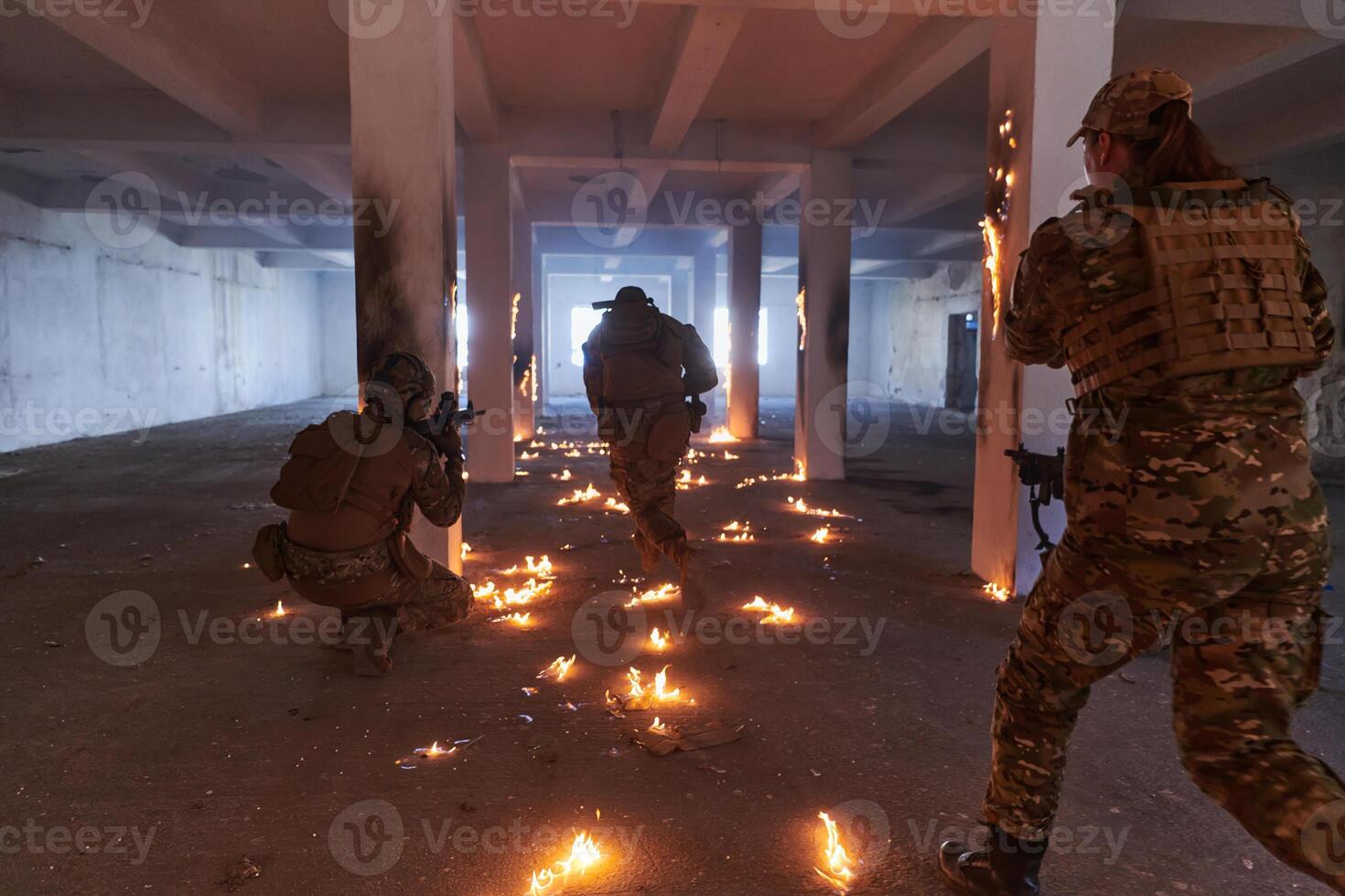 A group of professional soldiers bravely executes a dangerous rescue mission, surrounded by fire in a perilous building. photo