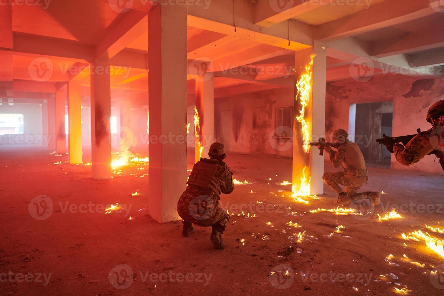 A group of professional soldiers bravely executes a dangerous rescue mission, surrounded by fire in a perilous building. photo