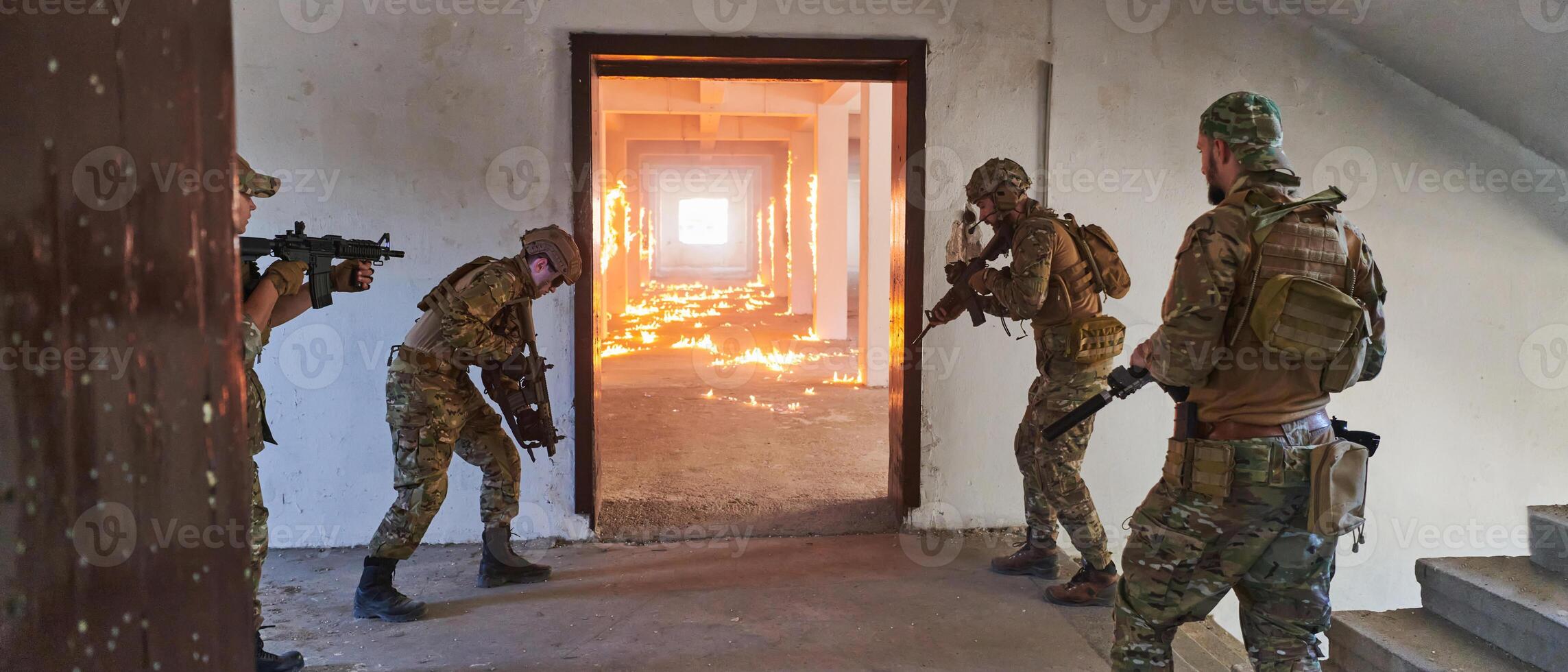 A group of professional soldiers bravely executes a dangerous rescue mission, surrounded by fire in a perilous building. photo