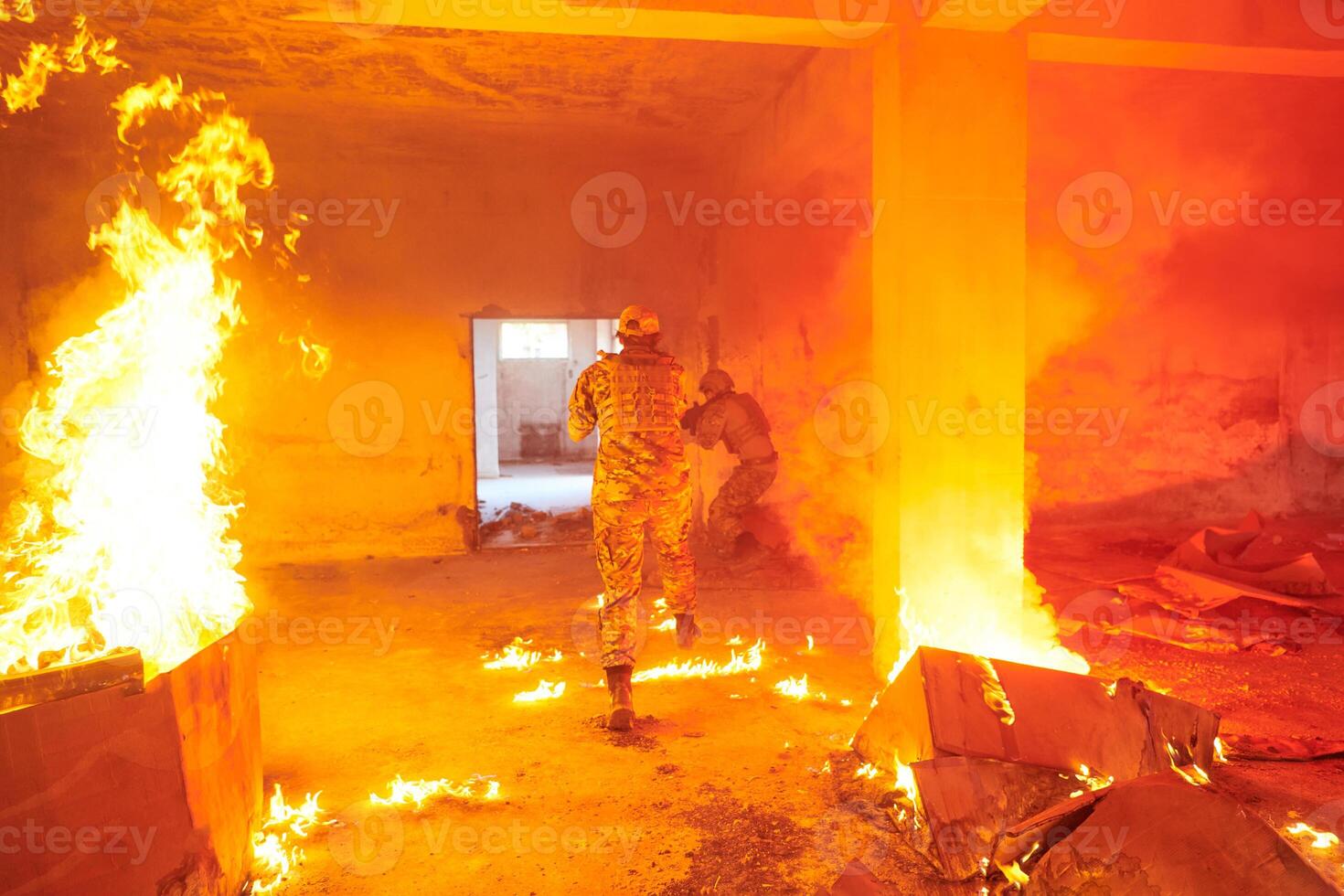 A group of professional soldiers bravely executes a dangerous rescue mission, surrounded by fire in a perilous building. photo